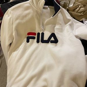 This woman’s small, Fila Sweat shirt and pants